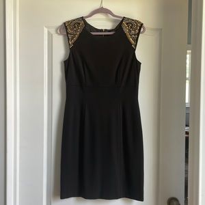 Dress with metal embellishments